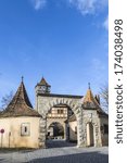 Small photo of famous Roeder gate in Rothenburg ob der tauber