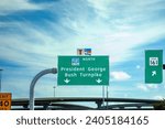 Small photo of Dallas, USA - November 6, 2023: highway signage in green at interstate direction George Bush turnpike in Dallas, Texas, USA.