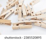 wooden clothespins scattered around - photos of wooden clothespins - wooden clothespins