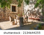 San Ignacio, Mulegé, Baja California Sur, Mexico. Table and chairs in a courtyard at the San Ignacio Mission.