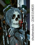 Small photo of Halloween decorations, skeleton toys. Skeleton head, torso, Halloween skeleton. Creepy smile, laughing skeleton. Preparing for Halloween and Day of the Dead holiday's.