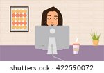 she works at the table .... | Shutterstock .eps vector #422590072