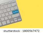 WORDPRESS text on keyboard over yellow background. Business and technology concept