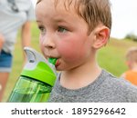 Children Drinking Water. A...