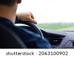 adult man driving a car.... | Shutterstock . vector #2063100902