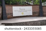 Small photo of Depok, Indonesia ( Feb 22th 2024) a signpost for the name of a faculty in Indonesian at the University of Indonesia, which means "Faculty of Social and Political Sciences, University of Indonesia"
