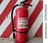 Small photo of APAR (Light Fire Extinguisher) or fire extinguisher is a tool used to extinguish fires or control small fires. Red Light Fire Extinguisher (APAR), Purbalingga 13 October 2023