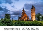Small photo of Vang Stave Church or Mountain Church of Our Savior, originally from Norway, reerected in polish town Karpacz. Evening September photo of church with dramatic sky in National Park Karkonoski.