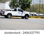 Small photo of Waterford, Connecticut, United States - May 12, 2022: Allied Snow Removal (Mystic Connecticut) Pickup Truck Driving on a Road