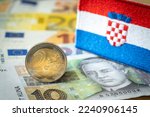 Small photo of The flag of Croatia against the background of the common currency of the European Union and the Croatian kuna; The concept of Croatia's accession to the euro zone