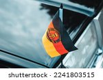 former DDR flag, democratic republic of germany, black car, communist symbols, former eastern bloc