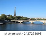 Small photo of The streets of Paris are famous for their romantic ambiance, adorned with elegant architecture, historic landmarks, and quaint cobblestone pathways.