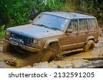 Small photo of Pos Gob, Gua Musang, Kelantan, Malaysia, 24.2.2020 - A convoy of 4X4 wheel drive vehicles to the forest in Gua Musang Kelantan..There is a motion blur effect in photo to show a movement effect.