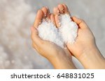 Hand Holding Sea Salt In The...