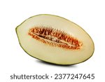 Small photo of Half of yummy, sappy, green tendral melon in a cross-section, isolated on white background with copy space for text or images. Sweet flesh with seeds. Pumpkin plant family. Side view. Close-up shot.
