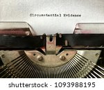 Small photo of Circumstantial Evidence heading typed in black ink on white paper on manual vintage typewriter