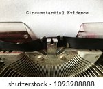 Small photo of Circumstantial Evidence heading typed in black ink on white paper on manual vintage typewriter