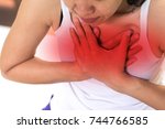 Small photo of Heart burn or Pericarditis disease concept. Woman suffer from heart burn hands on her chest.