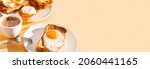 Small photo of fried Toast bread with four different types of cooked chicken eggs, scrambled eggs, fried eggs, poached egg and creamed egg.