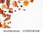 Autumn composition. Frame made of autumn dried leaves on white background. Flat lay, top view, copy space