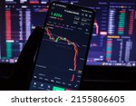Small photo of Bursa Turkey - May 13, 2022: Man holding smartphone on hand with cyrptocurrency app screen. Terra Luna coin collapse. UST is lose value against USD.