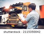 Small photo of Asian Truck Driver is Checking the Truck's Engine Maintenance Checklist. Lorry Driver. Inspection Truck Safety Driving. Shipping Cargo Freight Truck Transport.