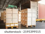 Packaging Boxes Stacked on Pallets Loading into Cargo Container. Shipping Trucks Transit. Supply Chain Shipment. Distribution Warehouse. Freight Trucks Cargo Transport. Supplies Warehouse Logistics.