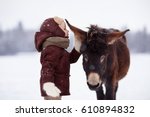 Boy And Donkey. Winter Walks...