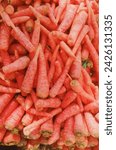Small photo of Red carrots, like their orange counterparts, are packed with nutrients such as beta-carotene, which is converted into vitamin A in the body, promoting good vision and immune function. They also contai