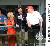 Small photo of BEDMINSTER,NJ-JULY 31,2022: Tucker Carlson (C) jokes with Former President Trump (R) at the 16th Hole during the final LIV Golf Tournament held at the Trump National Golf Club in Bedminster,NJ.