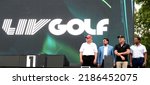 Small photo of BEDMINSTER,NJ-JULY 31,2022:(L-R) former President Trump, Yasir AlRumayyan ,Greg Norman,Majed AlSorour wait on stage to greet the winning LIV Players at the Trump National Golf Club in Bedminster,NJ.