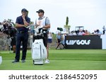 Small photo of BEDMINSTER,NJ-JULY 29,2022: Phil Mickelson (L) talks to his Caddie at the 16th Tee during the LIV Golf Tournament held at the Trump National Golf Club in Bedminster,NJ.