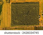 Small photo of Panoramic view of a Celtic maze in Wicklow, Ireland maze in the grass