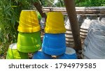 Small photo of Beautiful colorful flower pot, cement molder, planter. Traditional flower pots, nursery pots, made from plain terracotta.it is a container, where plants grows and cultivated.