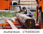 Carpenter Working On A Sawmill...