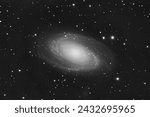 Small photo of Galaxy Messier 81 - 12 million light-years away in the constellation Ursa Major (monochrome), also known as Bode's Galaxy
