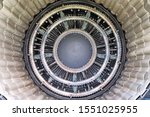 Small photo of airplane jet engine interior gas exhaust nozzle against aircraft motor parts background. Inside wide detailed view of modern technology military plane gear. Fighter jet afterburner compartment