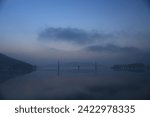 Small photo of a view of the lake on the verge of sunrise
