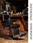 Small photo of Vintage barber chair. Barbershop business. Barber shop chair. Modern hairdresser and hair salon. Barber shop for men. Barbershop theme. Barbershop interior. Stylish vintage barber chair.