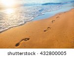 Beach  Wave And Footprints At...