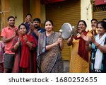 Small photo of Assam, India. 22 March 2020. People clap and clang utensils as a gesture to show gratitude to the helpers and medical practitioners, working relentlessly to fight coronavirus during Janta curfew.