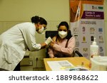 Small photo of New Delhi, India. 08 January 2021. Health officials and volunteer take part in dry run or a mock drill for the coronavirus (COVID-19) vaccine delivery, at a Hospital.