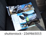 Small photo of Vinnytsia, Ukraine; September 26, 2023. Mercedes-Benz Sprinter service book with car keys. Mercedes-Benz Sprinter drivers main handbook. Mercedes-Benz Sprinter keys.
