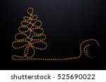the golden beads are laid in... | Shutterstock . vector #525690022