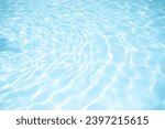 Small photo of Water background, ripple and flow with waves. Summer blue swimming pool pattern. Ripple Water in swimming pool with sun reflection
