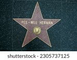 Small photo of Hollywood, California USA - May 12, 2023: Pee-Wee Herman's Star on Hollywood Walk of Fame on May 12, 2023 in Hollywood, California. This star is located on Hollywood Blvd.