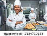 Smiling african  female bakers...