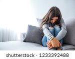 Young hopeless woman suffering from depression having nervous breakdown, copy space. Stressed sad young woman having mental problems, feeling bad, need psychological help, addicted heartbroken girl 