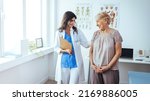 Small photo of Doctor and patient discussing something at hospital . Medicine and health care concept. Doctor and patient. Patient Having Consultation With Doctor In Office. Doctor consulting with a patient