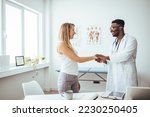 Small photo of Friendly male doctor's hands holding female patient's hand for encouragement and empathy. Partnership, trust and medical ethics concept. Bad news lessening and support. Patient cheering and support